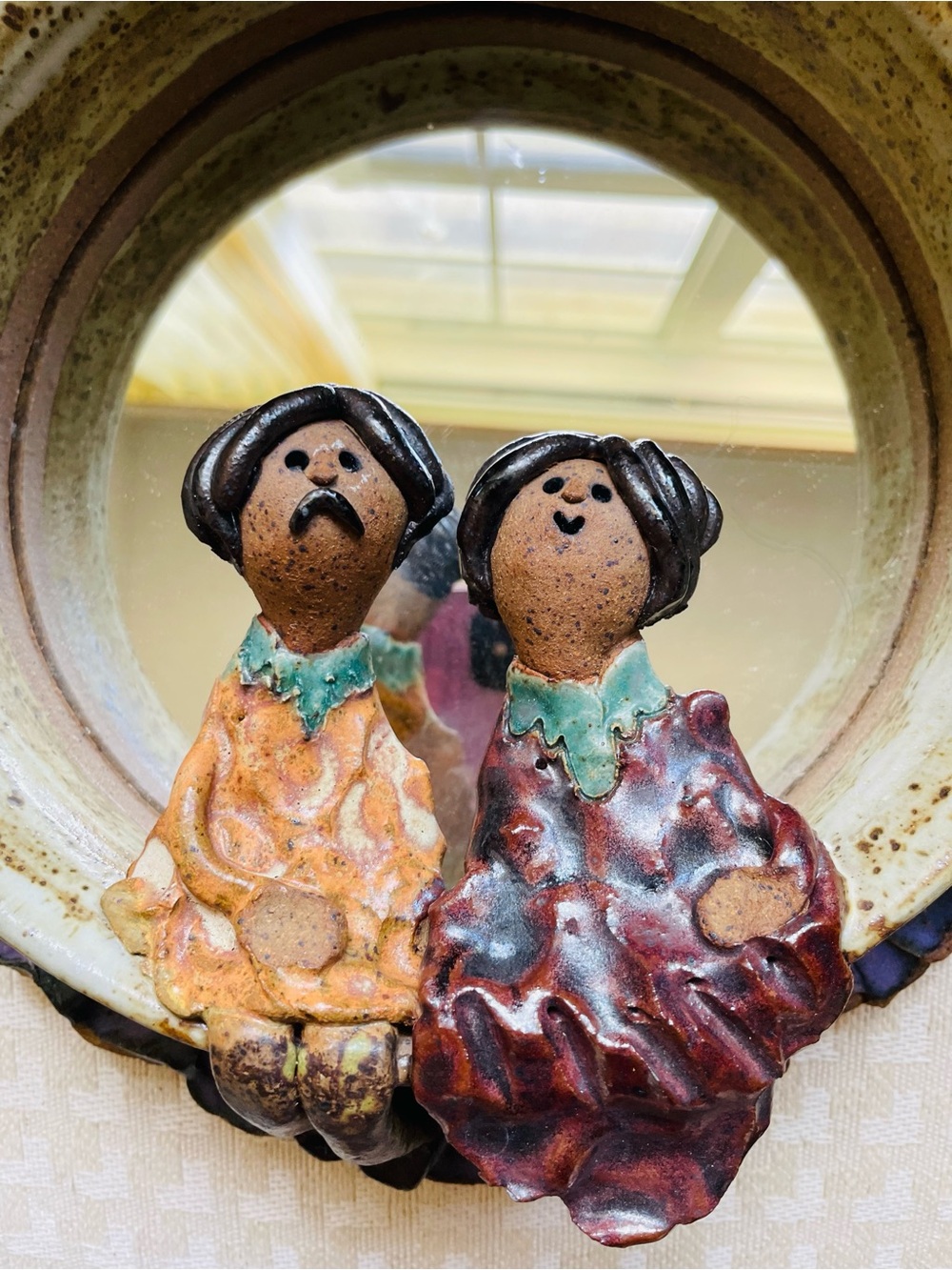 Studio art pottery-Carol Kaminski-vintage-lovers sit on bottom edge of mirror